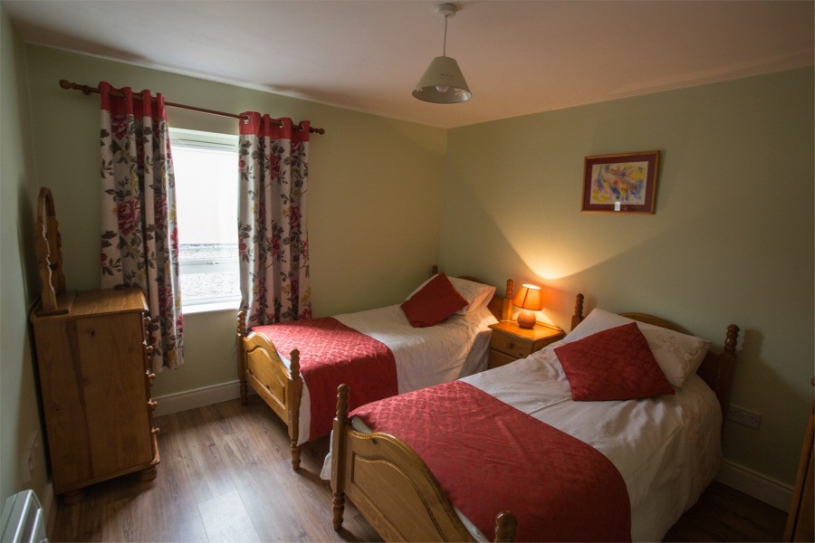 Bedroom in the first floor apartment at Árasáin Bhalor - 4 Star Self Catering Apartments & House, Falcarragh, County Donegal, Ireland