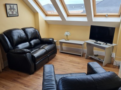 Living area in the second floor, 1 bedroom apartment at Árasáin Bhalor - 4 Star Self Catering Apartments & House, Falcarragh, County Donegal, Ireland